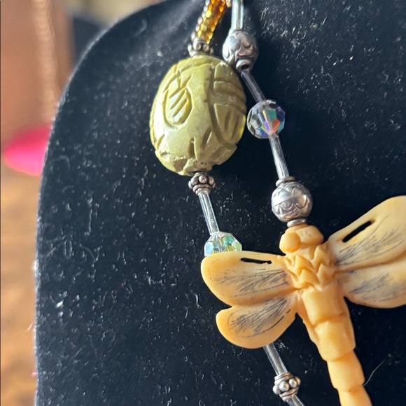 Baltic Amber set in silver with carved bone dragonfly and jade necklace